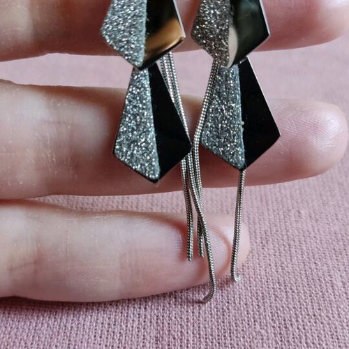 Steel earrings new in silver color