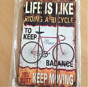 Διακοσμητικό κάδρο ξύλινο 30χ48 life is like riding a bicycle...