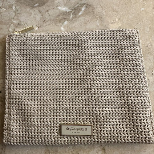 YvesSaintLaurent beige toiletry bag