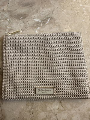 YvesSaintLaurent beige toiletry bag