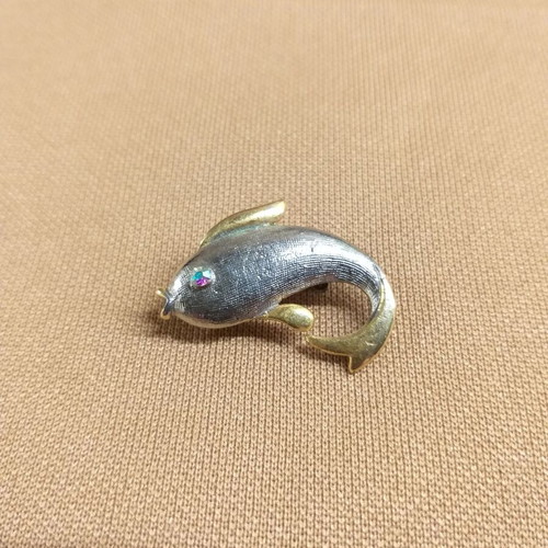 Dolphin pin used, silver and gold color