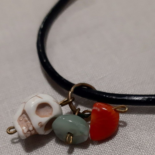 Skill bracelet with copper charms and genuine black leather