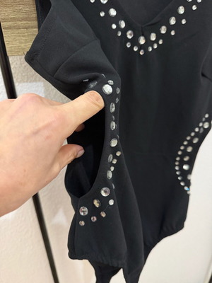 Black sleeveless bodysuit new with cut outs and strass, size M/L