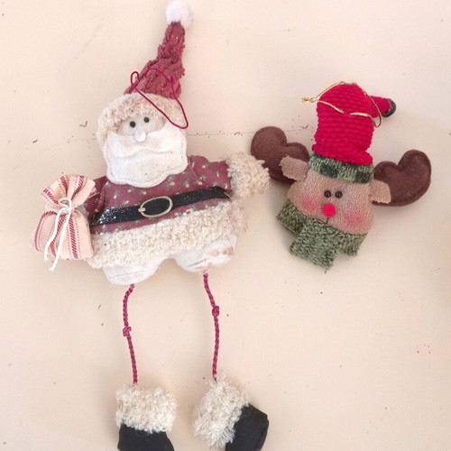 Handmade knitted Christmas ornaments used, Santa and reindeer