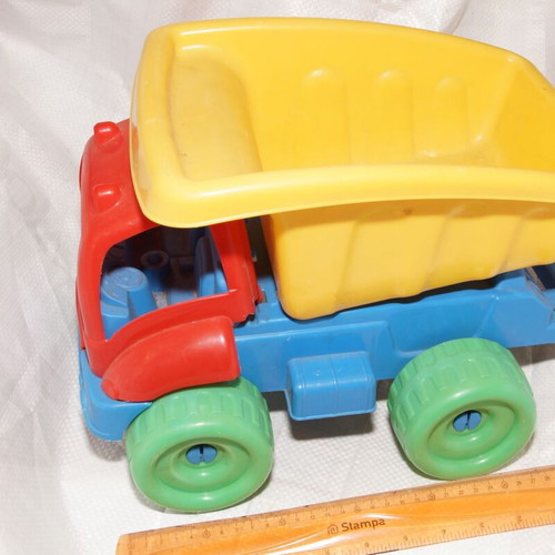 Toy cars used, pack of 2 plastic trucks and trailer