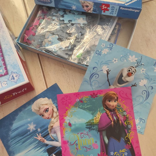 Frozen puzzle set like new with Ravensburger and Trefl