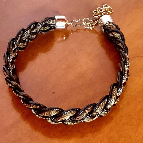 Braided necklace like new, black and gold tone metal