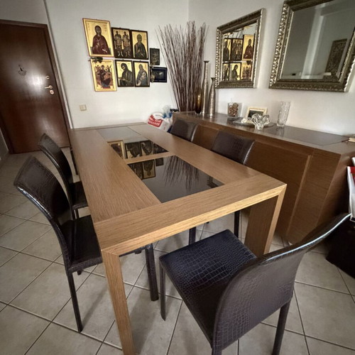 Dining table with 6 leather chairs used