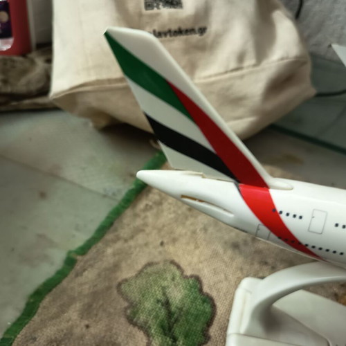 Emirates A380-800 model plane used with missing two rear wings