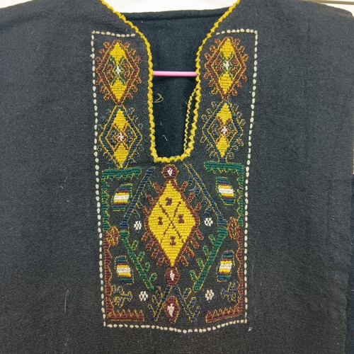 Collectible traditional wool dress used with yellow border