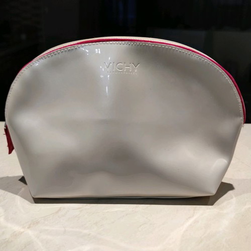 Vichy and Dove toiletry bags new, white, spacious