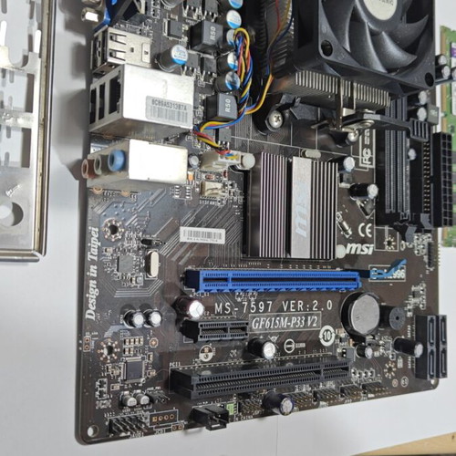 MSI GF615M-P33 V2 motherboard set used with AMD Sempron 145 CPU, 4GB RAM, cooler