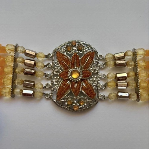 Bracelet used with floral design and colorful beads
