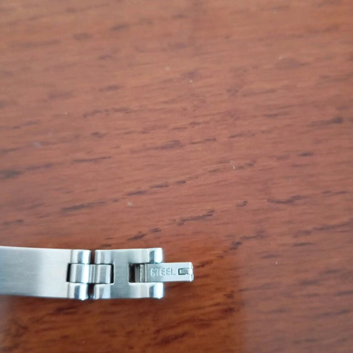 Men's stainless steel bracelet used with secure clasp