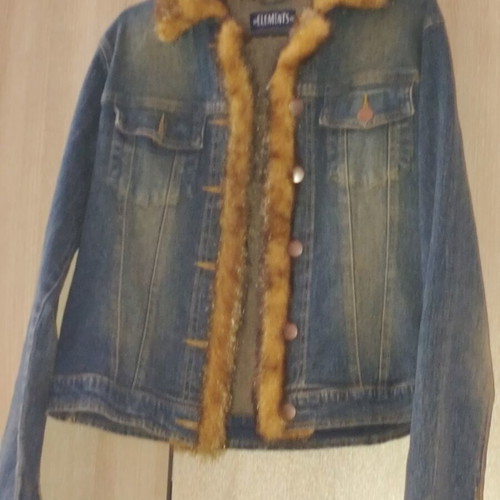 Denim jacket used with fur trim