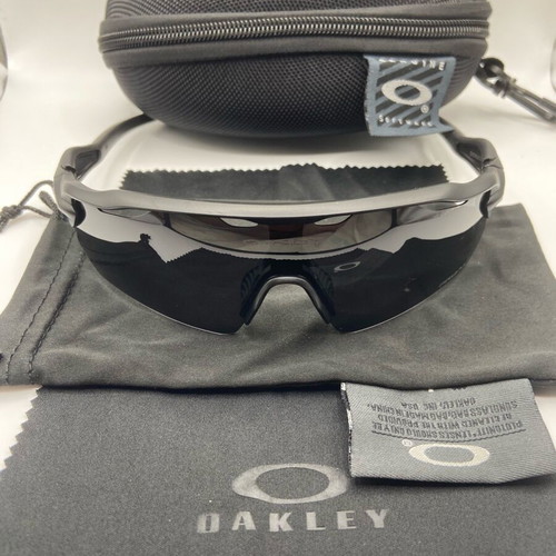Oakley Sunglasses new with tags, black and silver