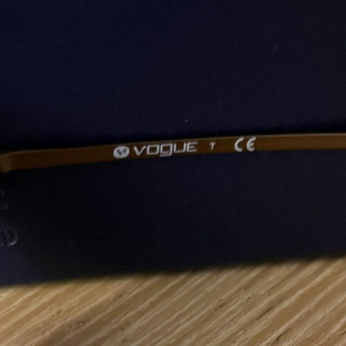Vogue butterfly-shaped women's sunglasses with rhinestones