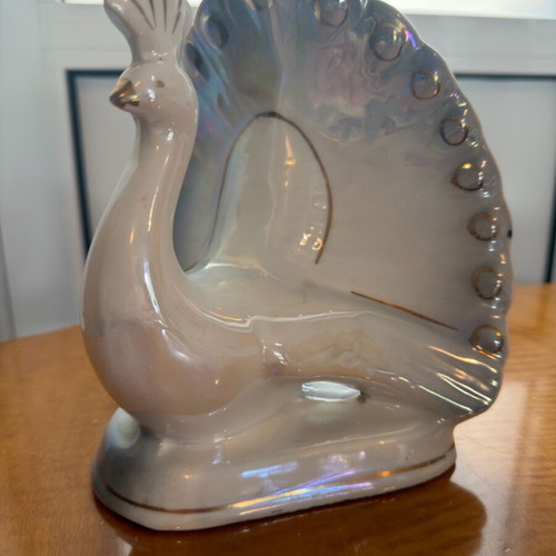 Vintage ceramic peacock decoration used with iridescent finish