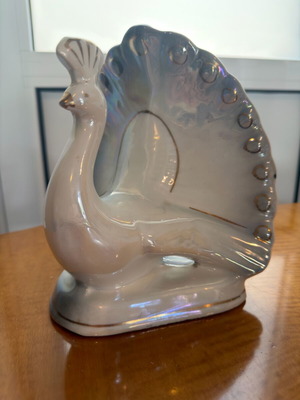 Vintage ceramic peacock decoration used with iridescent finish