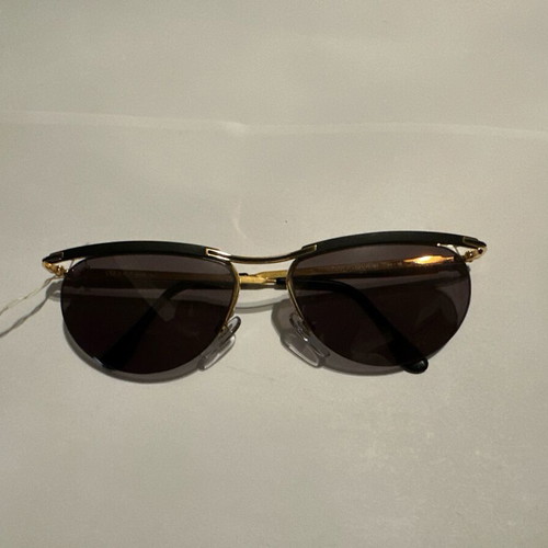 Vintage Vogue sunglasses with gold and black details, new