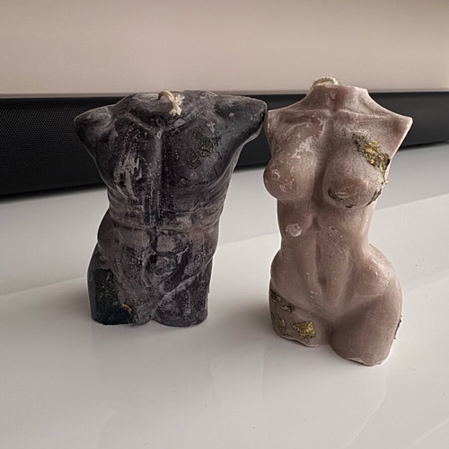 Set of soy candles shaped as female and male bodies like new