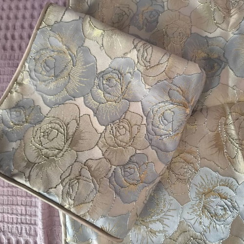 Set of two blue pillowcases with rose design 40x40