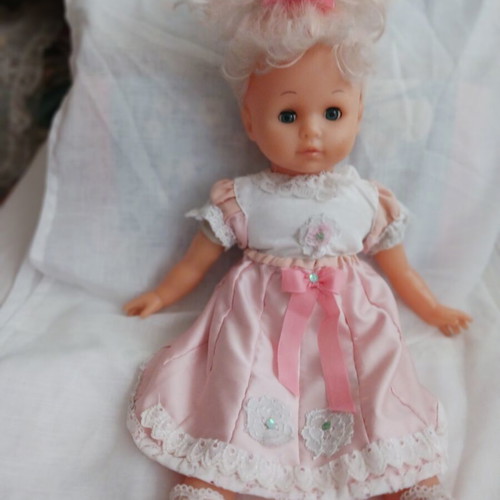 Vintage doll with handmade clothes like new