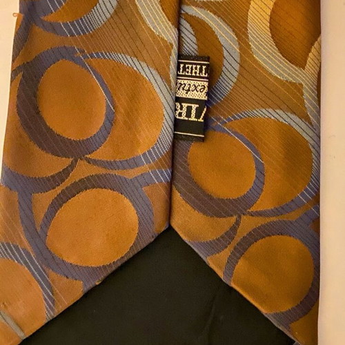 Vintage Trevira tie with geometric pattern in brown and gold, like new