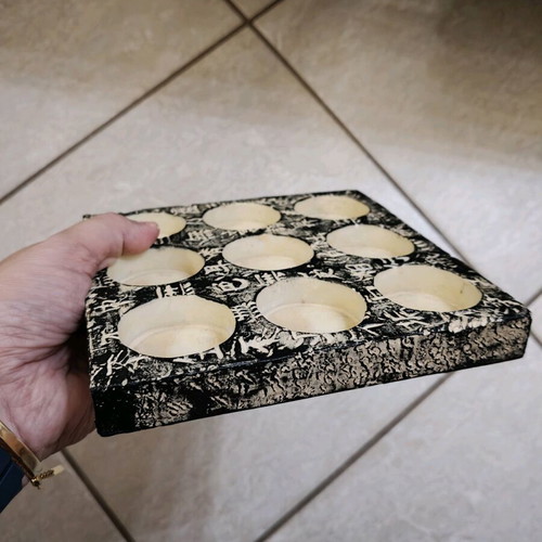 Stone base for 9 tealights like new with Asian designs