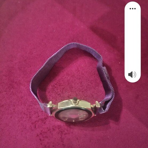 Wristwatch women's used with magnetic clasp purple color
