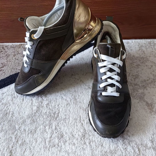 Louis Vuitton sneakers used size 38.5 with visible wear