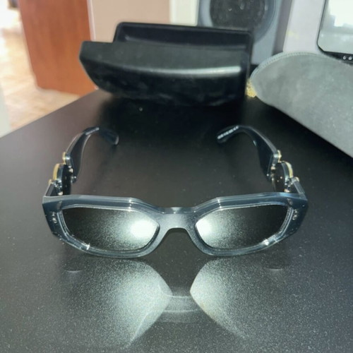 Versace sunglasses like new with transparent acetate frame