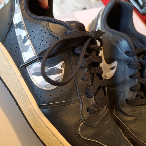 Nike low used black athletic shoes size 38.5