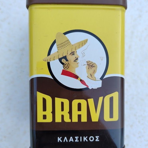 Bravo metal coffee tin collectible 2010 like new