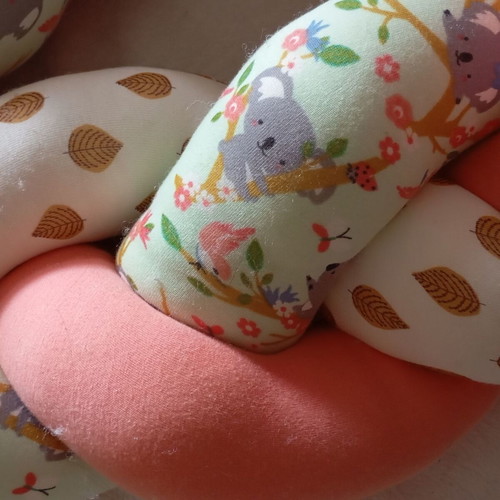 Braided bumper for baby crib like new with leaves and koala