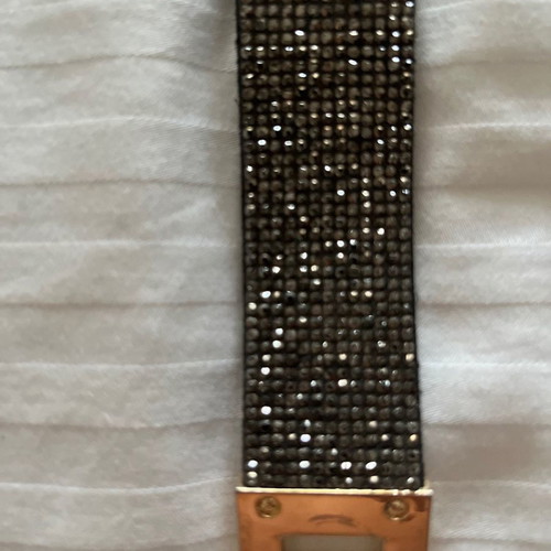 Bracelet with rhinestones used, black and silver with gold clasp