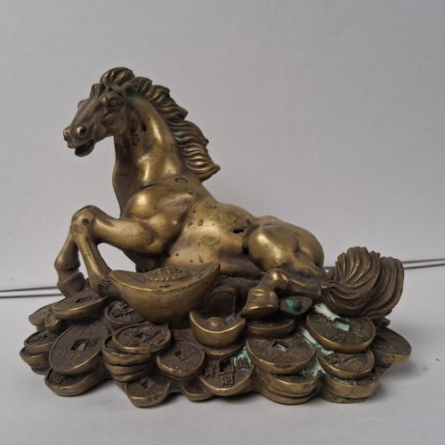 Bronze horse sculpture used, vintage wealth symbol on coins