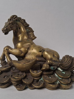 Bronze horse sculpture used, vintage wealth symbol on coins