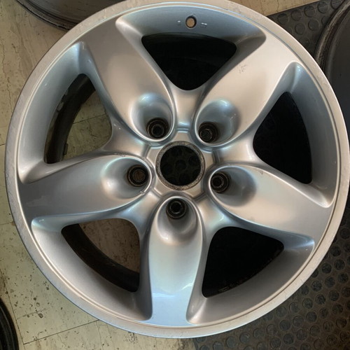 Porsche Cayenne 18-inch rims used, missing caps