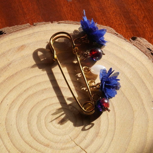 Handmade brooch with blue and gold hanging details new