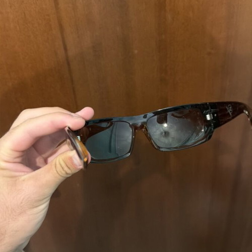 Sunglasses used, brown color