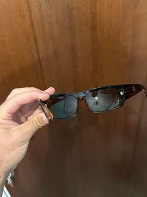 Sunglasses used, brown color