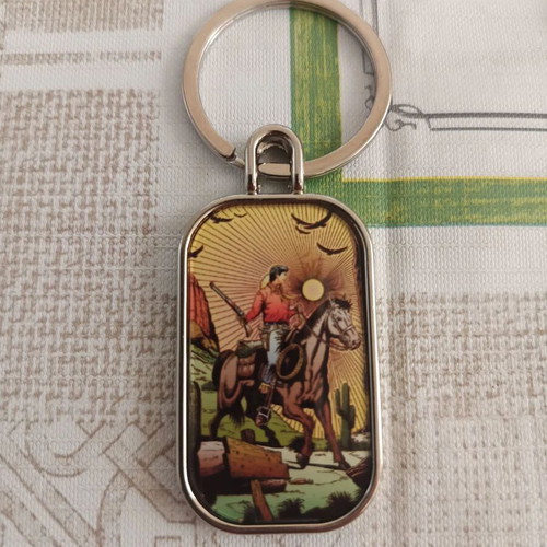 Set of 3 double-sided keychains with Jim Adams and Diana