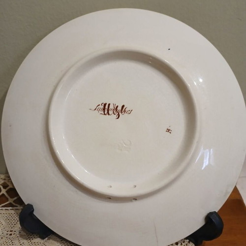 Set of 2 used Sarreguemines decorative plates with portraits of Nicholas II and Alexandra