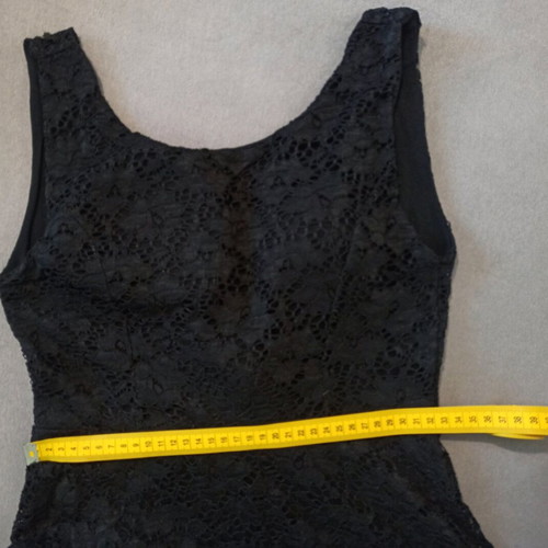 Black dress like new, one size with lace and open back