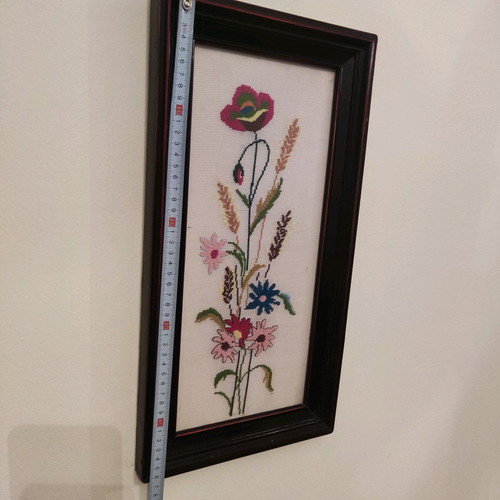 Decorative textile painting with handmade embroidery used, flowers