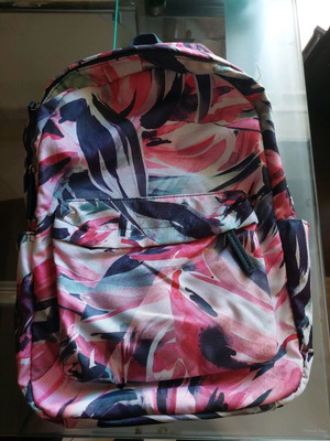 Back Pack Accesorize like new with side pockets and zipper