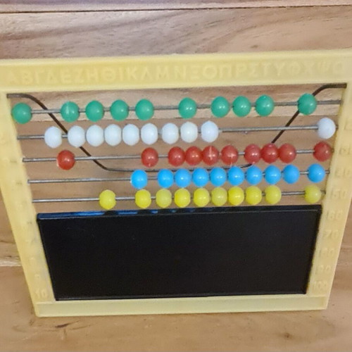 Yellow plastic abacus up to 50 with alphabet and 1980s blackboard like new