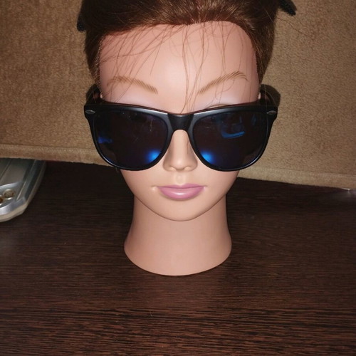 Unisex sunglasses used, matte black, with minor scratches