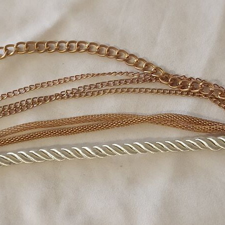 Women's bracelet with cream cord and gold chains, new